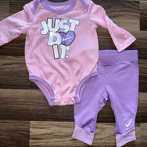 Nike Lavender and Pink Baby Onesie